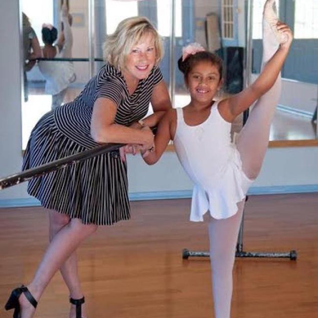 Caption: Cathy Nesbitt-Stein dancing with daughter Vivi Anne (Sources: Pres...