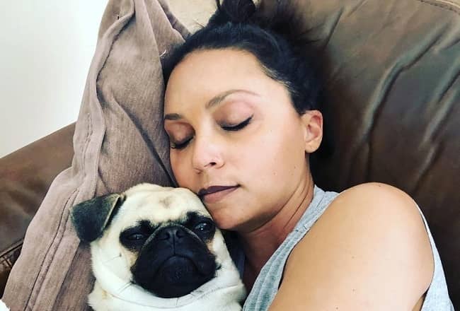 Caption: Danielle Nicolet with her pet (Instagram) .