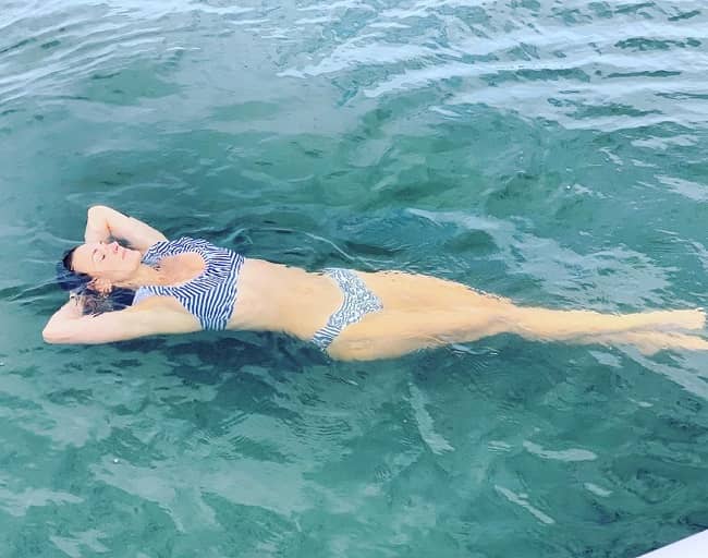 Caption: Krystal Ball posing for a photo(Instagram) .