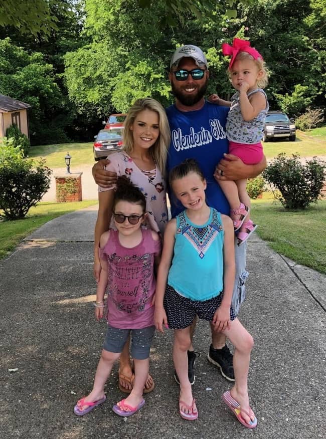 Corey with his wife and kids