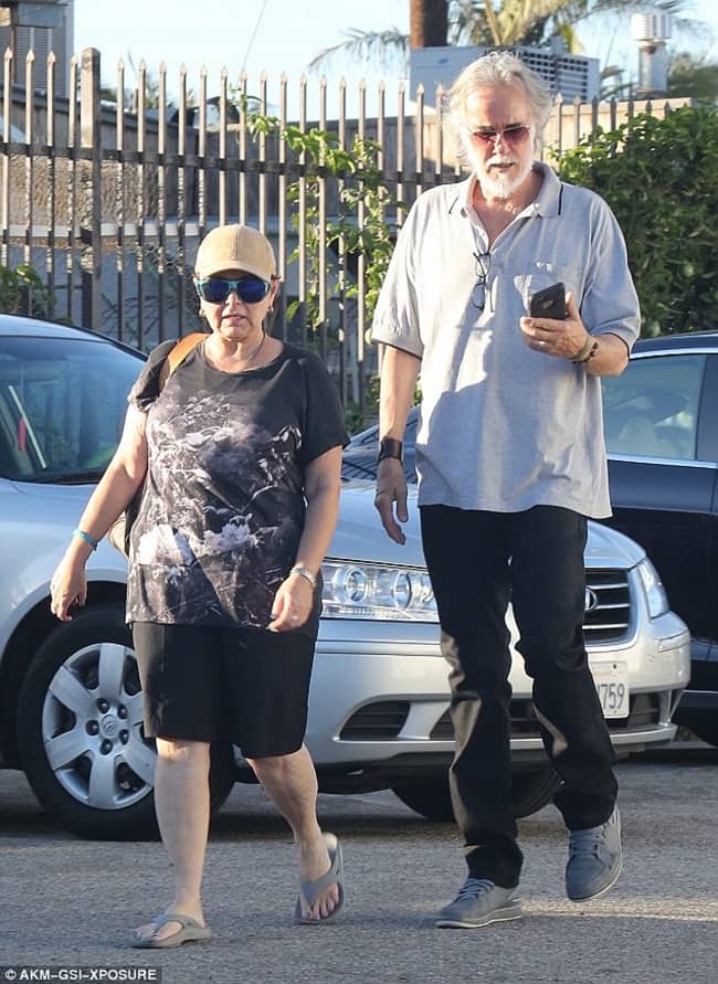 Johnny Argent walking with his wife (Source Daily Mail)