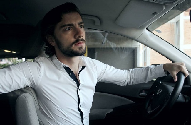 Juan Perez posing in his car (Source Instagram)