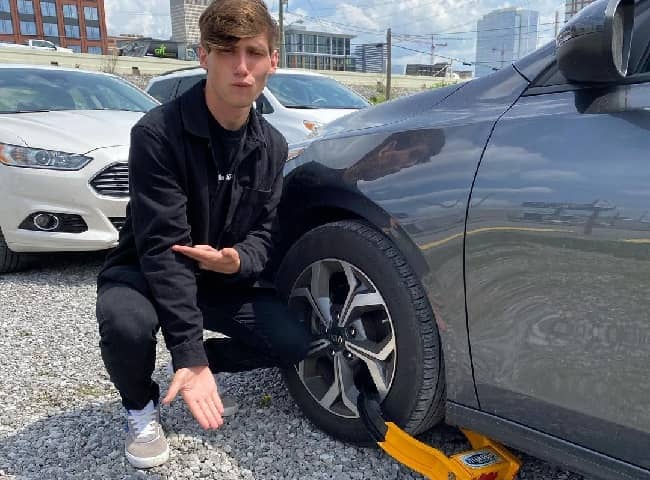 Seth Pry posing with his car (Source Instagram)