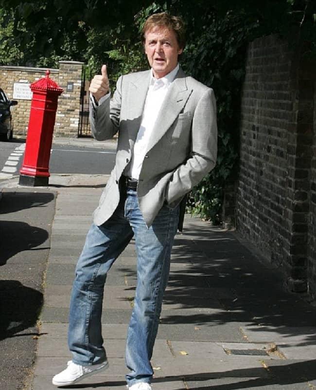 Paul McCartney posing for a photo (Source Daily Mail)