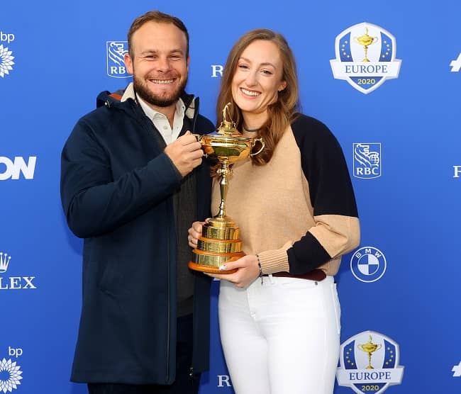 Tyrrell Hatton with his wife (Source Golf Monthly)