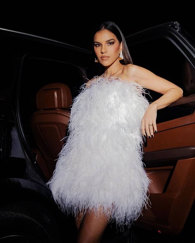 Mariana Rios posing with her car (Source Instagram)