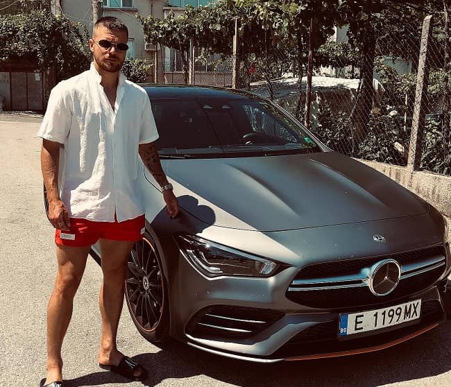 Radoslav Kirilov posing with his car (Source Instagram)