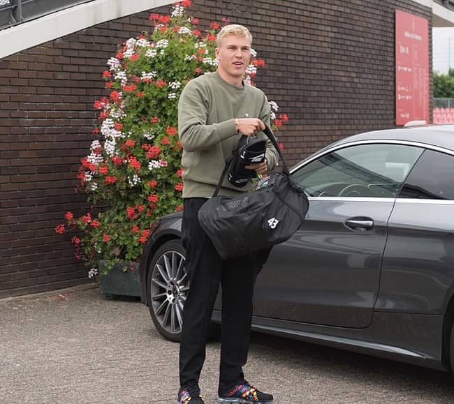 Rasmus Kristensen posing with his car (Source Instagram)