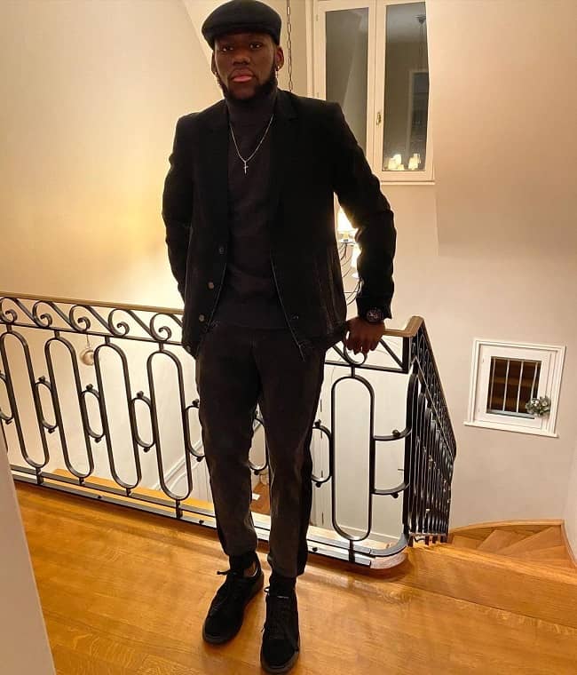 Jean Onana posing for a photo in his home (Source Instagram)