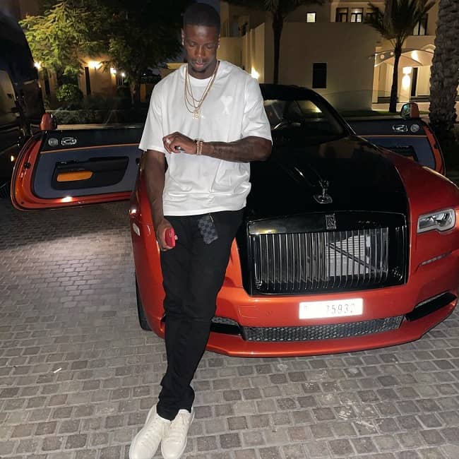 Lucas Joao posing with his car (Source Instagram)